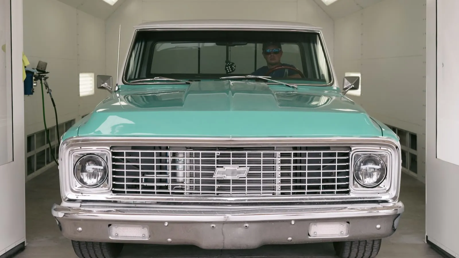 Classic Chevrolet pickup in the spray booth