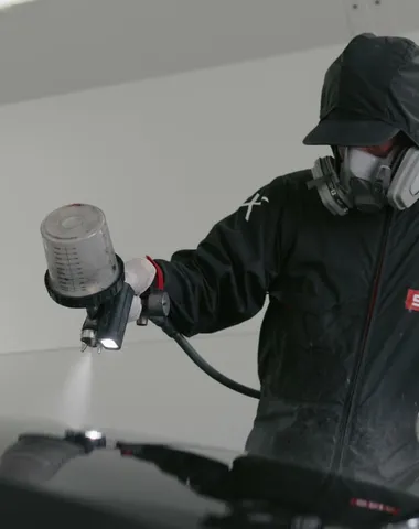 Technician spraying Peel Clear